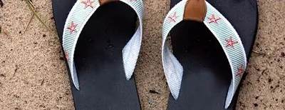 Flip flops on sand